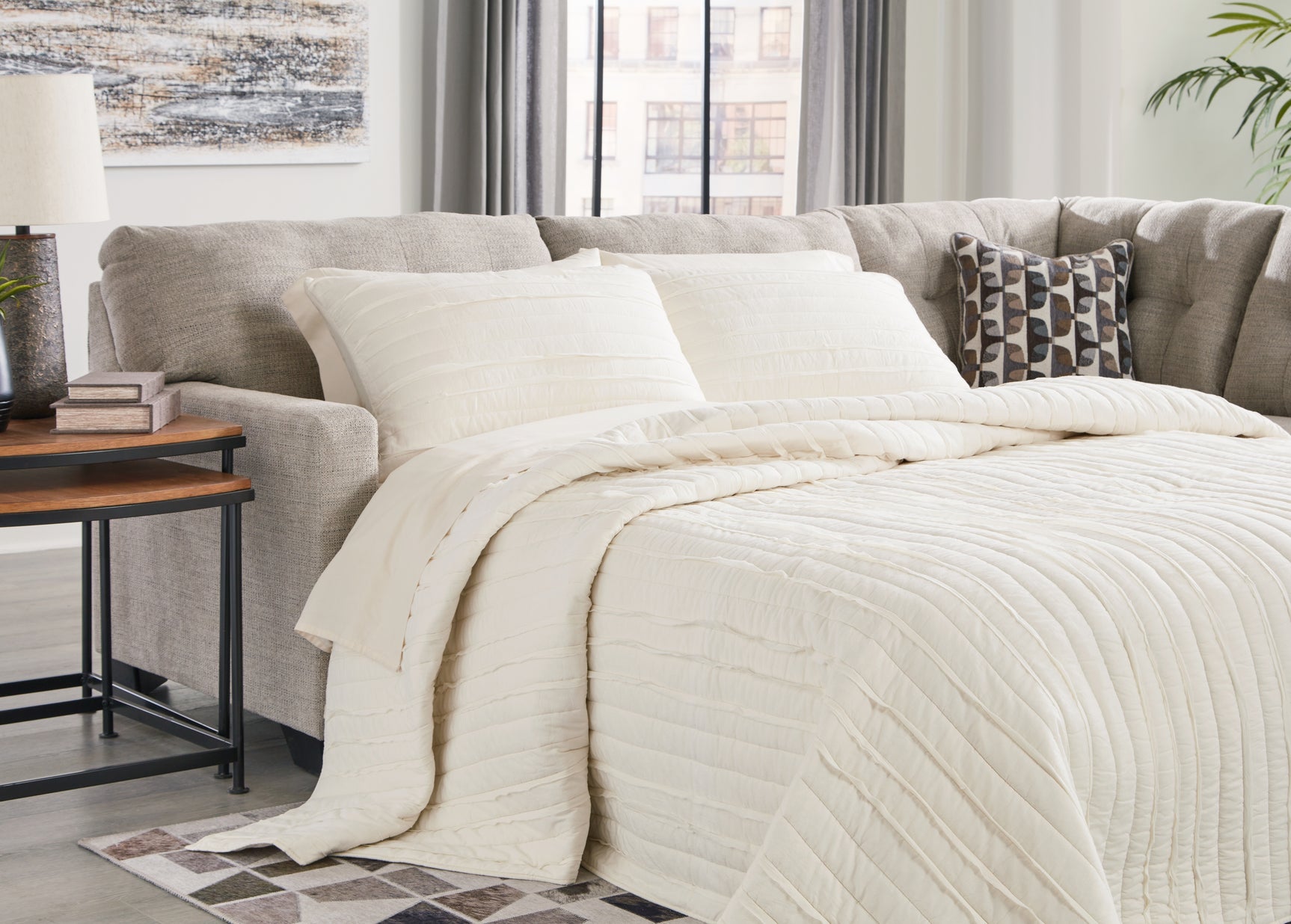 Sam's Furniture - Ashley Furniture - Mahoney Sectional - 2-Piece Sleeper Sectional with Chaise / Pebble - 31004S4