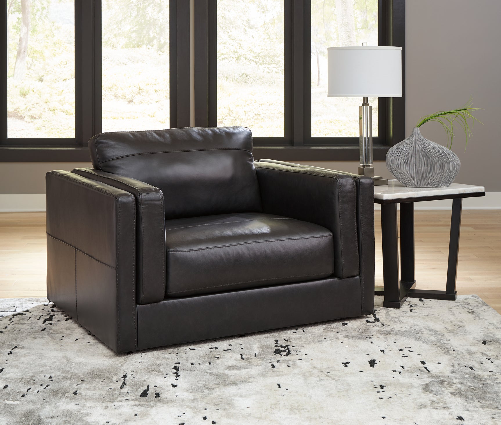 Sam's Furniture - Ashley Furniture - Amiata Living Room - Chair and a Half / Onyx - 5740523