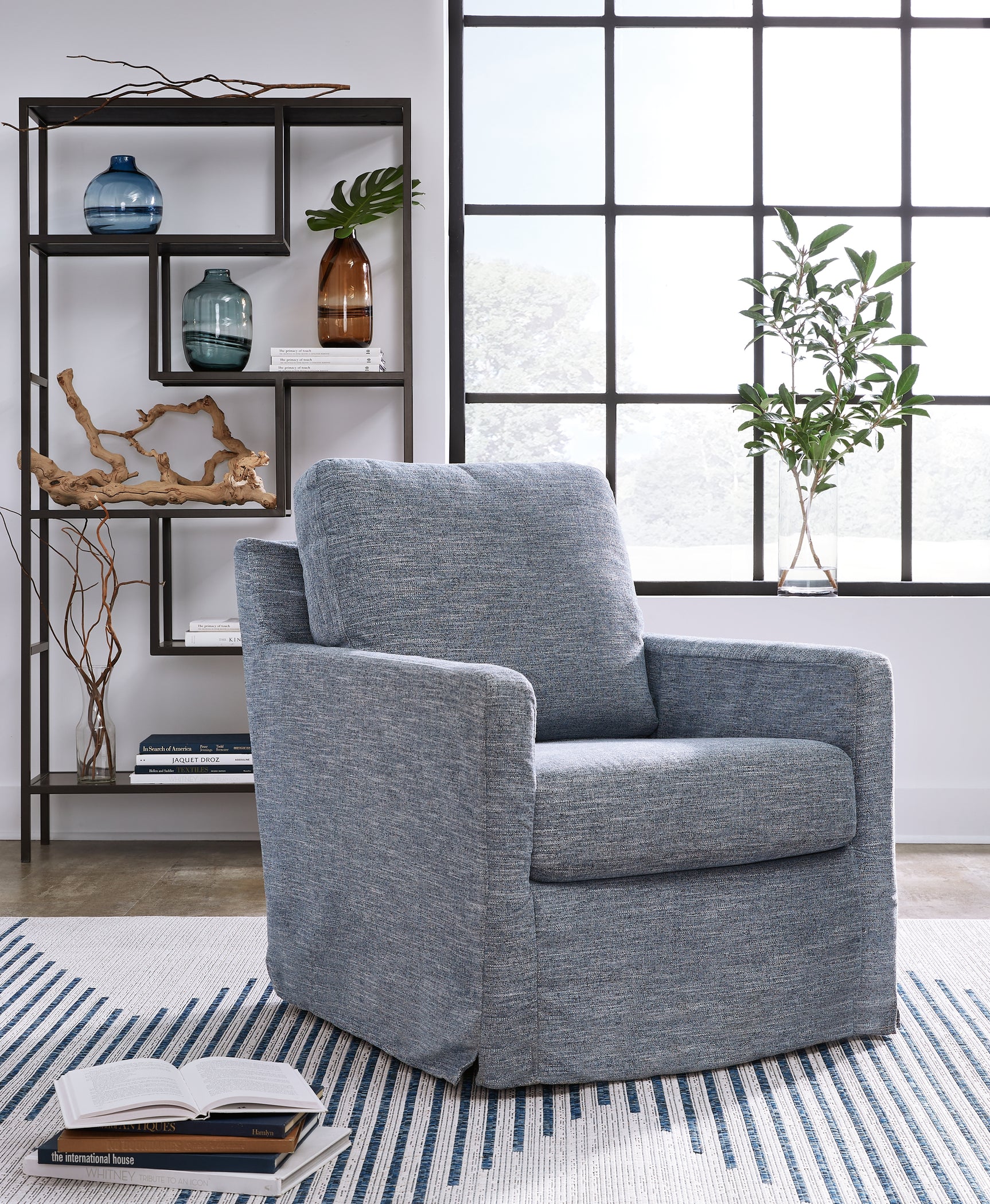 Sam's Furniture - Ashley Furniture - Nenana Next-Gen Nuvella Swivel Glider Accent Chair - Swivel Glider Accent Chair / Denim - A3000646