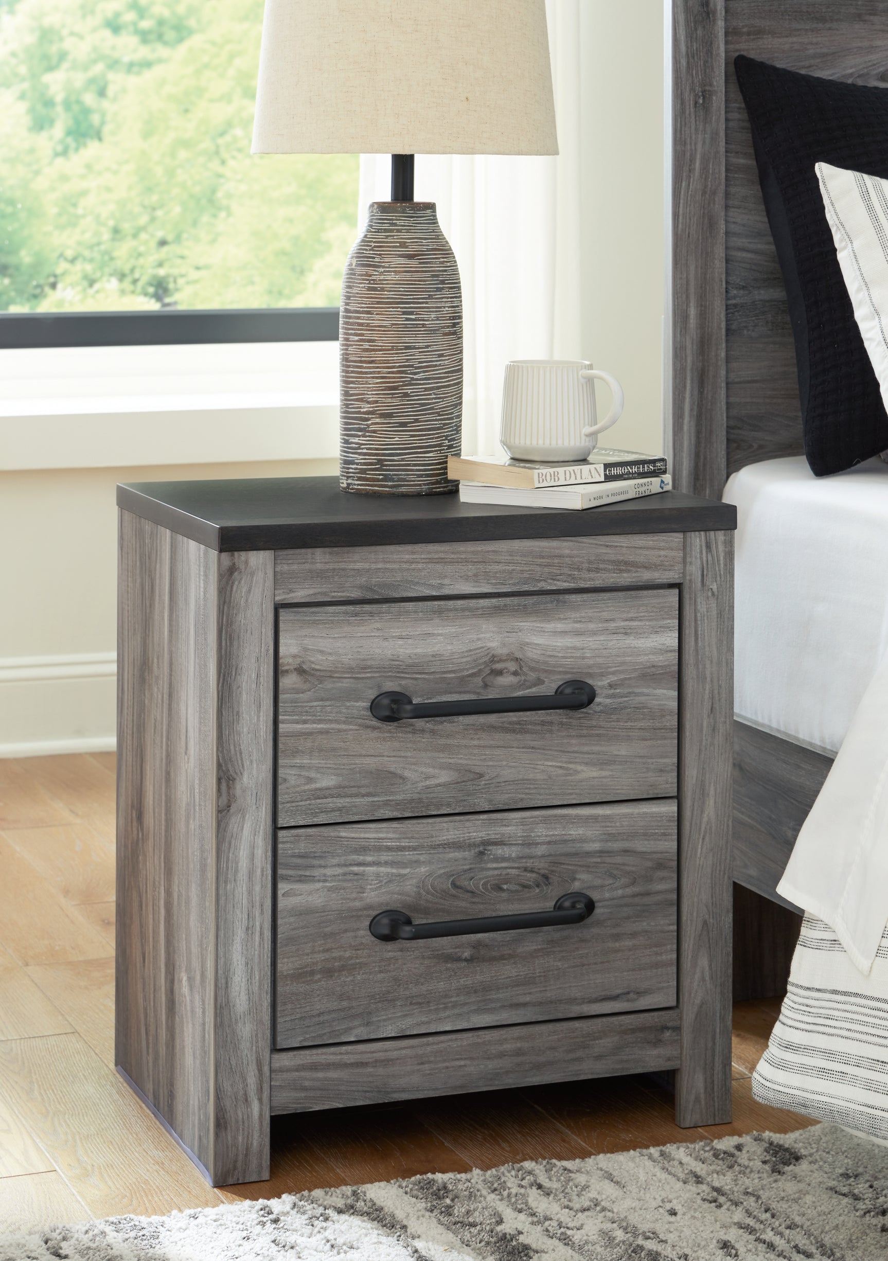 Sam's Furniture - Ashley Furniture - Bronyan Bedroom - Two Drawer Night Stand / Dark Gray - B1290-92