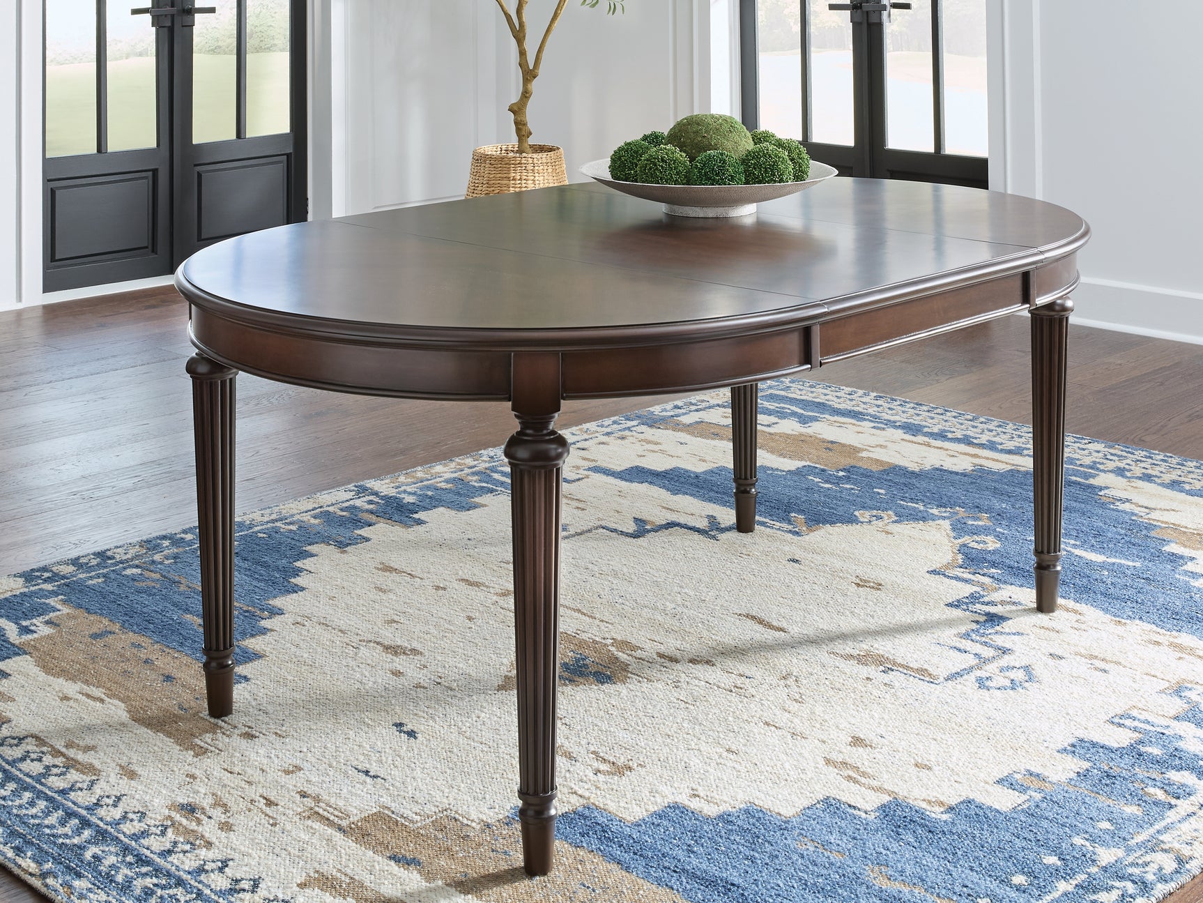 Sam's Furniture - Ashley Furniture - Lavinton Dining Room - Oval Dining Room EXT Table / Brown - D764-35