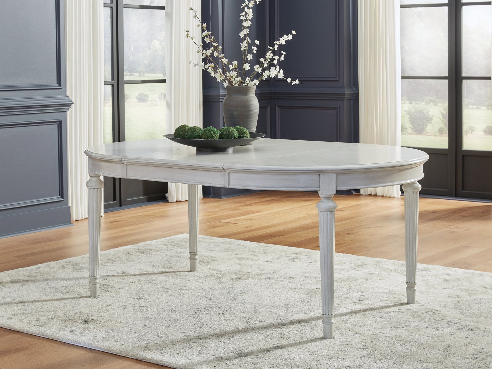 Sam's Furniture - Ashley Furniture - Montelaine Dining Room - Oval Dining Room EXT Table / Antique White - D795-35