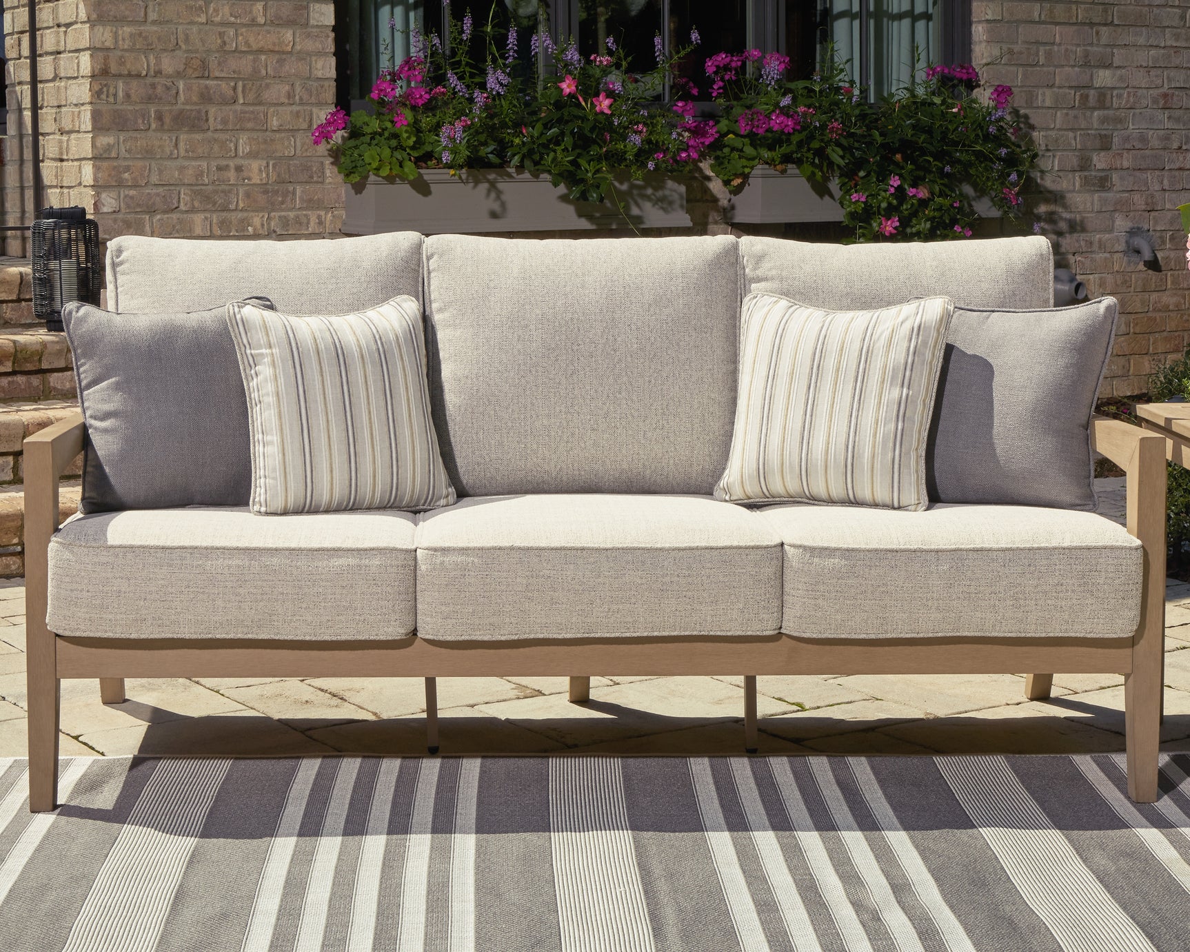 Sam's Furniture - Ashley Furniture - Hallow Creek Outdoor - Sofa with Cushion / Driftwood - P560-838