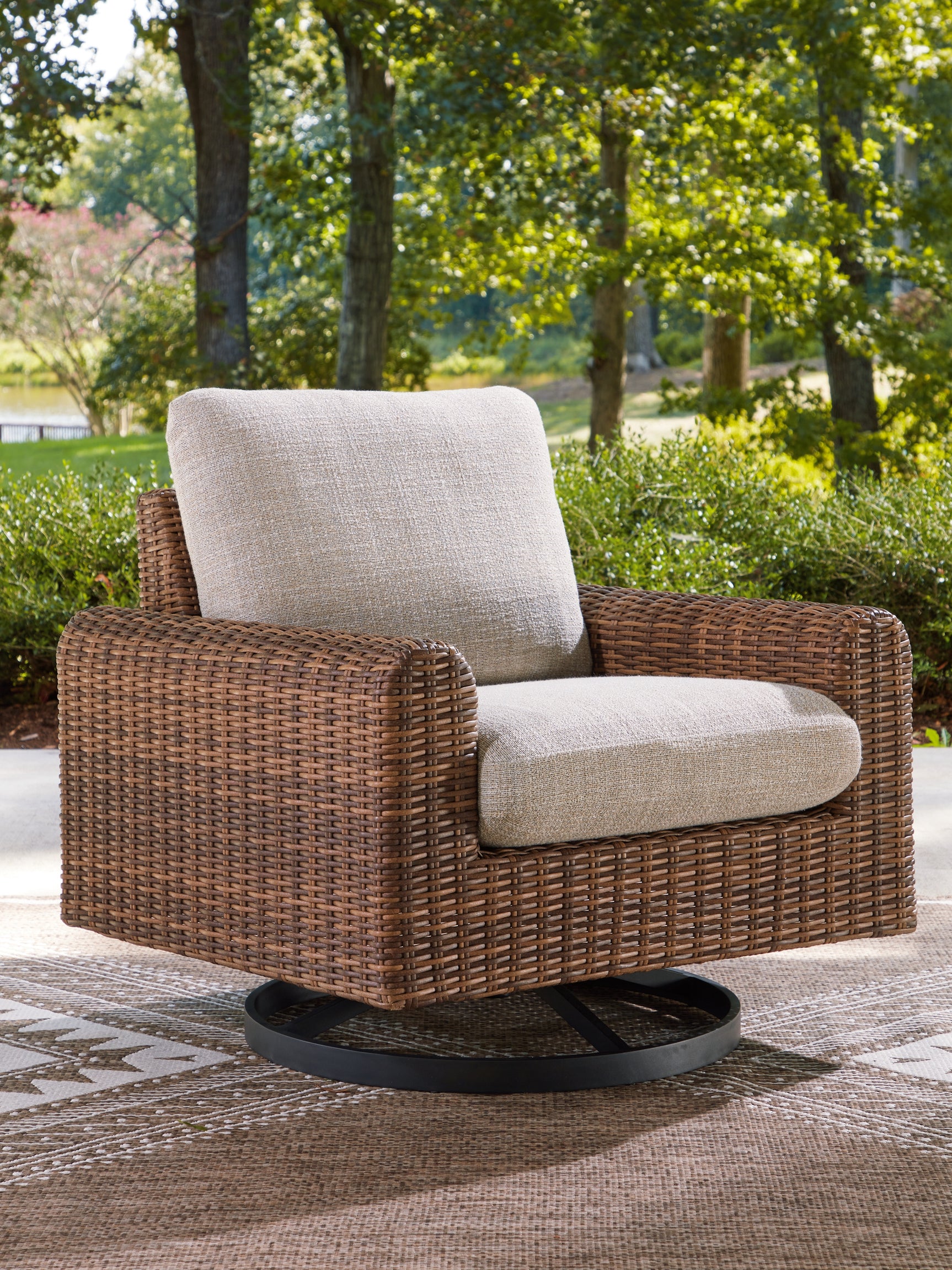 Sam's Furniture - Ashley Furniture - Dolan Creek Outdoor - Swivel Lounge w/ Cushion / Gray/Brown - PCP610-821