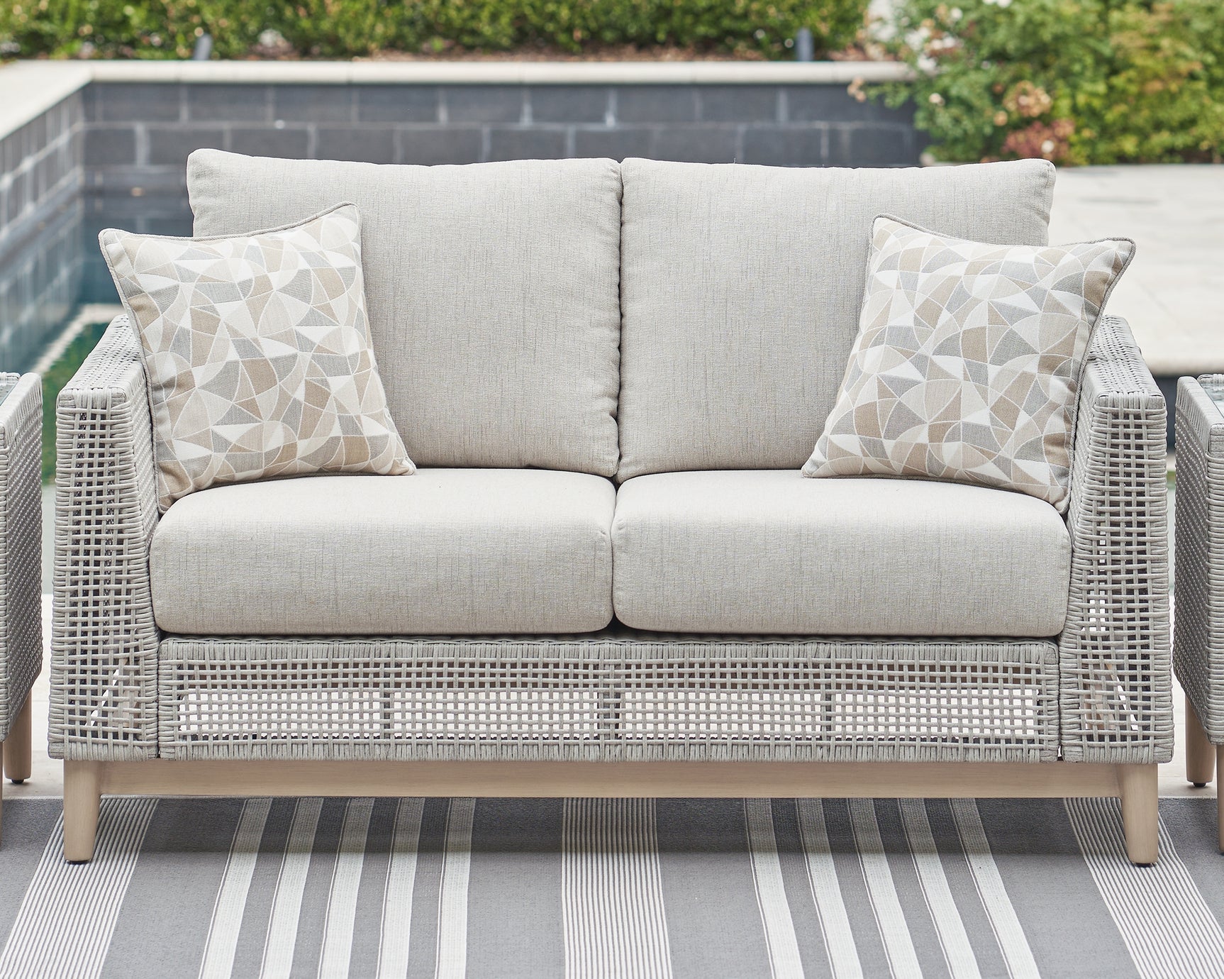 Sam's Furniture - Ashley Furniture - Seton Creek Outdoor - Loveseat w/Cushion / Gray - P798-835