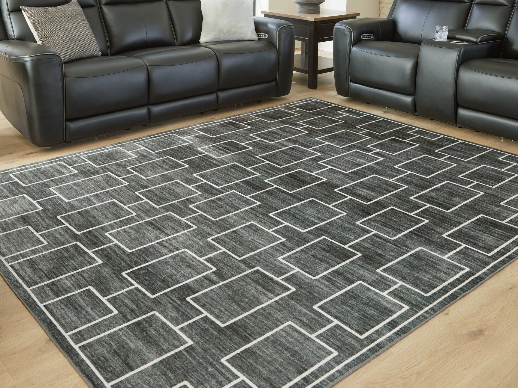 Sam's Furniture - Ashley Furniture - Elderland Rug - Washable 7'6" x 9'6" Area Rug / Black/Gray - R407401