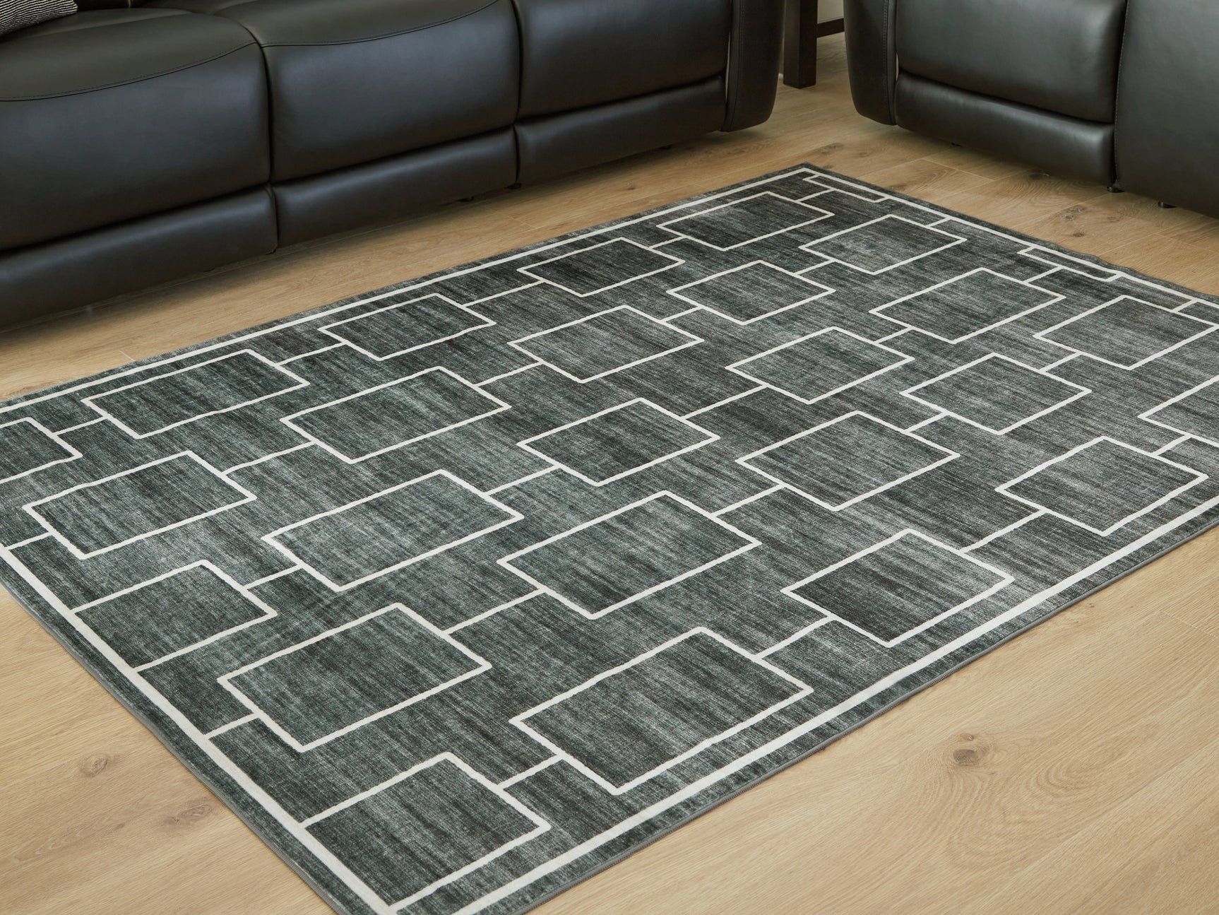 Sam's Furniture - Ashley Furniture - Elderland Rug - Washable 5' x 7' Area Rug / Black/Gray - R407402