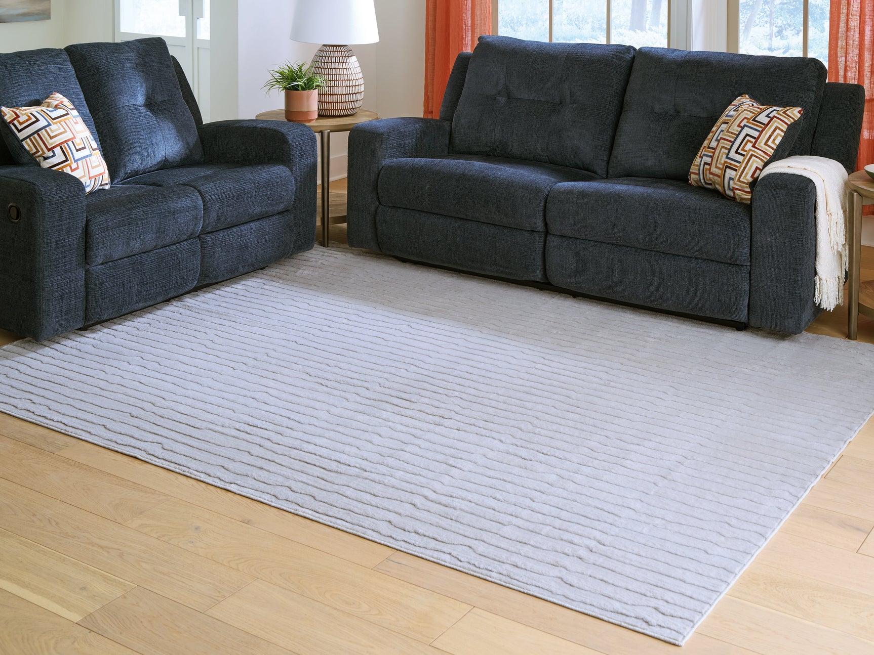 Sam's Furniture - Ashley Furniture - Worthley Rug - Washable 8' x 10' Area Rug / Gray - R407451