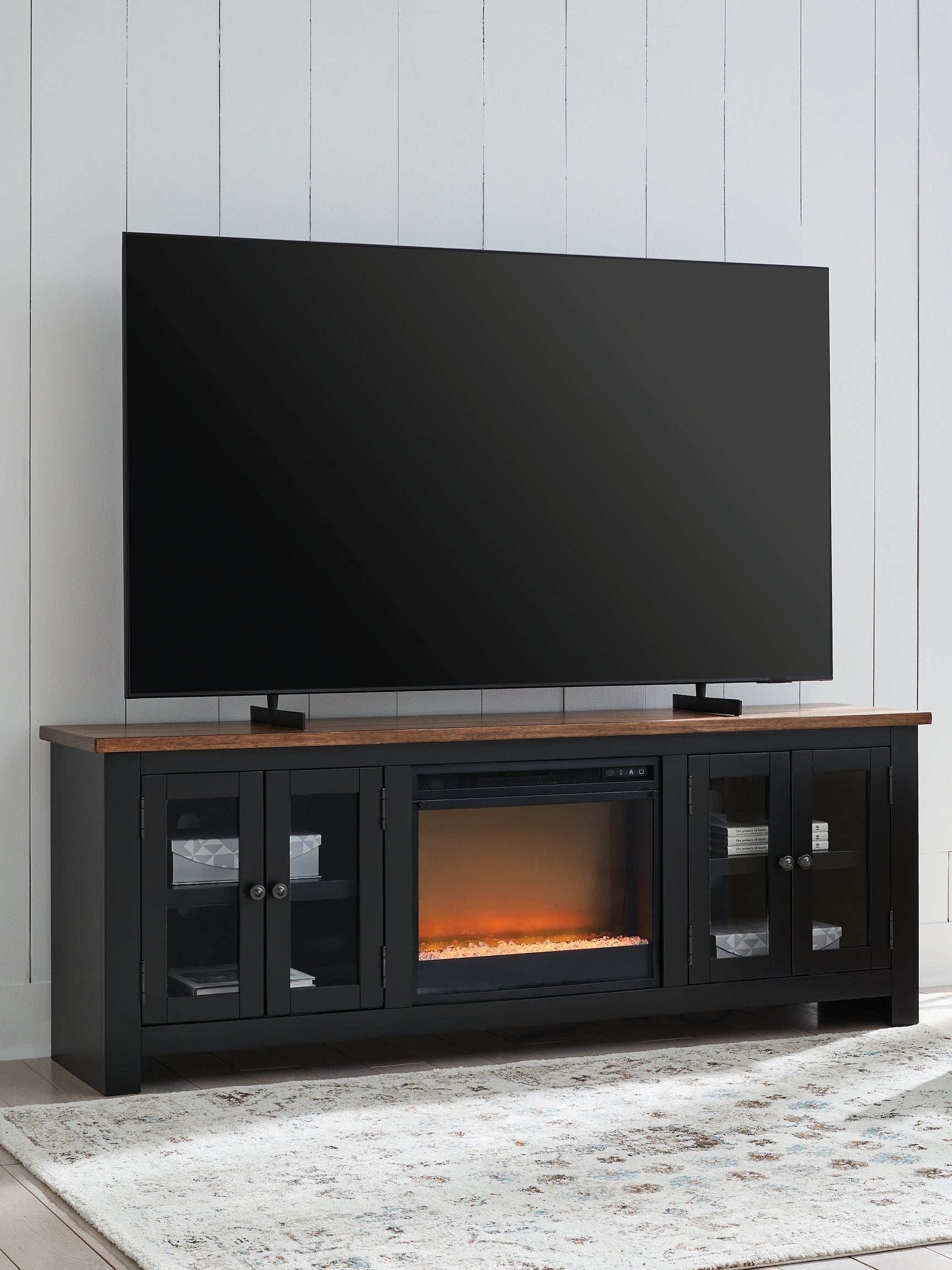 Sam's Furniture - Ashley Furniture - Wildenauer 76" TV Stand with Electric Fireplace - 76" TV Stand with Electric Fireplace / Brown/Black - W664W2