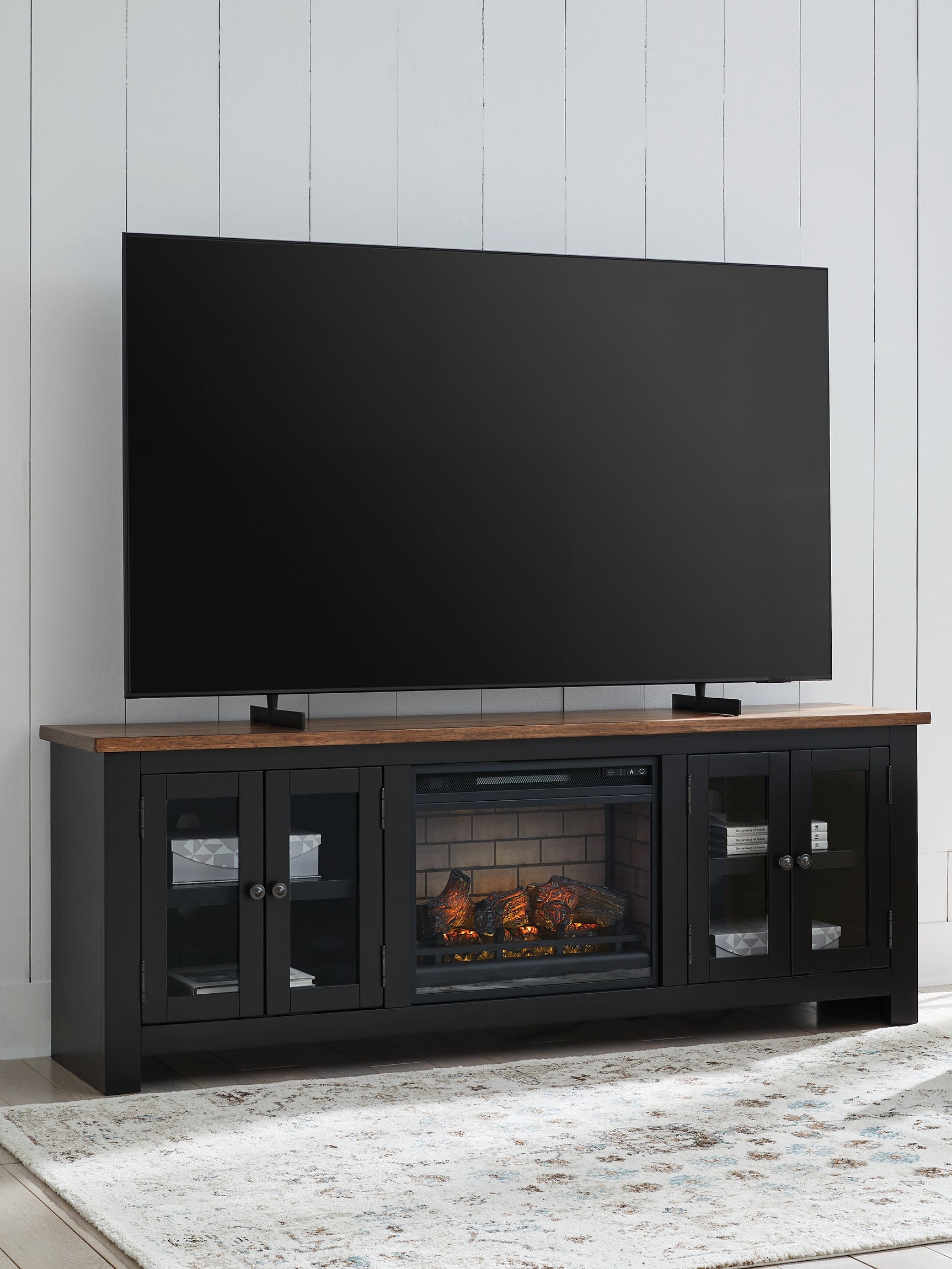 Sam's Furniture - Ashley Furniture - Wildenauer 76" TV Stand with Electric Fireplace - 76" TV Stand with Electric Fireplace / Brown/Black - W664W1