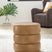 Sam's Furniture - Ashley Furniture - Ummi Living Room - Swivel Accent Ottoman / Caramel - A3000791