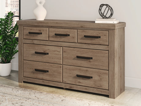 Sam's Furniture - Ashley Furniture - Oliandon Bedroom - Seven Drawer Dresser / Light Brown - PCB2844-31