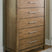 Sam's Furniture - Ashley Furniture - Cabalynn Bedroom - California King Panel Bed with Storage / Light Brown - B974B9