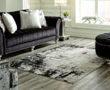 Sam's Furniture - Ashley Furniture - Zekeman Rug - 7'10" x 10' Rug / Black/Cream/Gray - R404921