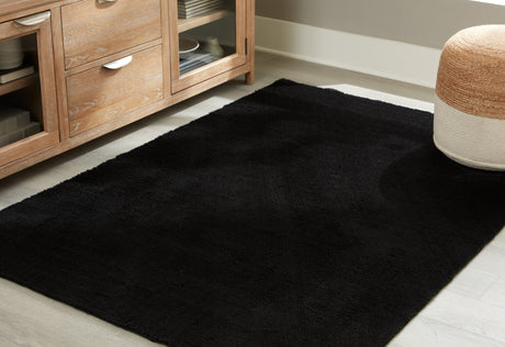 Sam's Furniture - Ashley Furniture - Anaben Rug - 5' x 7' Washable Rug / Black - R406312