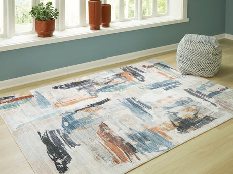 Sam's Furniture - Ashley Furniture - Hessland Rug - 8' x 10' Washable Rug / Multi - R407051
