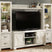 Sam's Furniture - Ashley Furniture - Bellaby Entertainment Center - 4-Piece Entertainment Center / Whitewash - W331W2